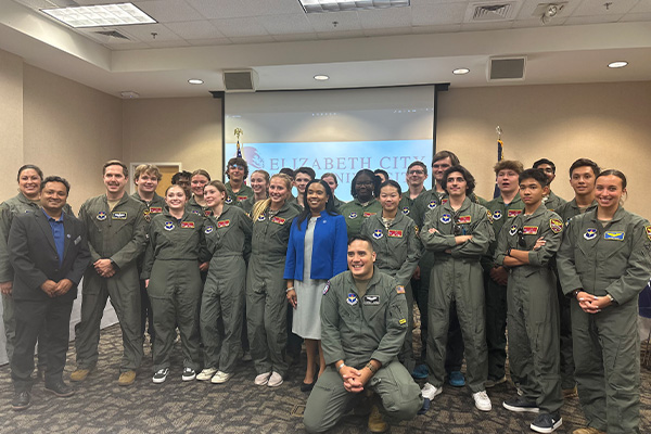 Flight Academy students stand with ECSU Chancellor Karrie G. Dixon and Dr. Kuldeep Rawat