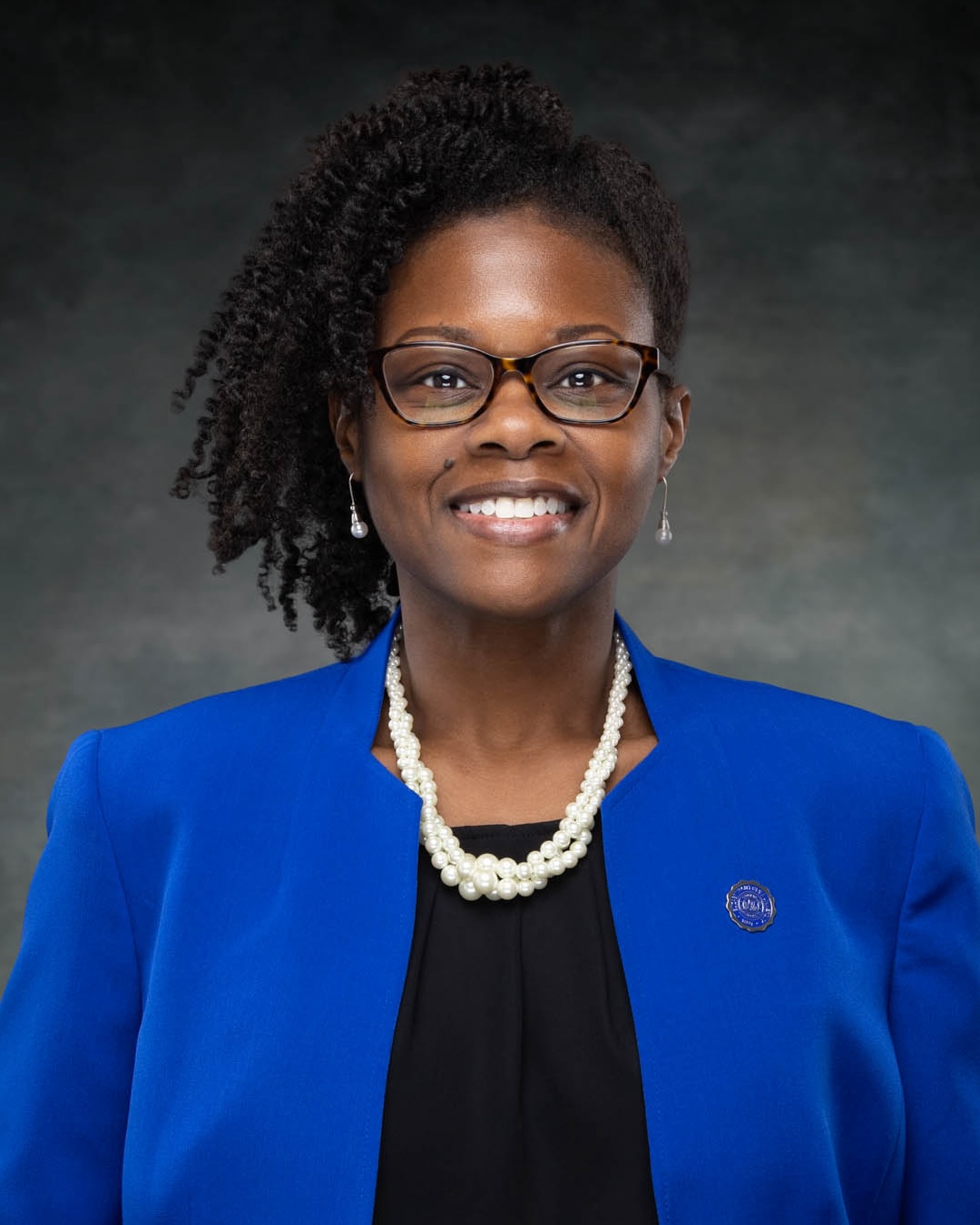 Regina Rudisill, General Counsel, smiling in a headshot