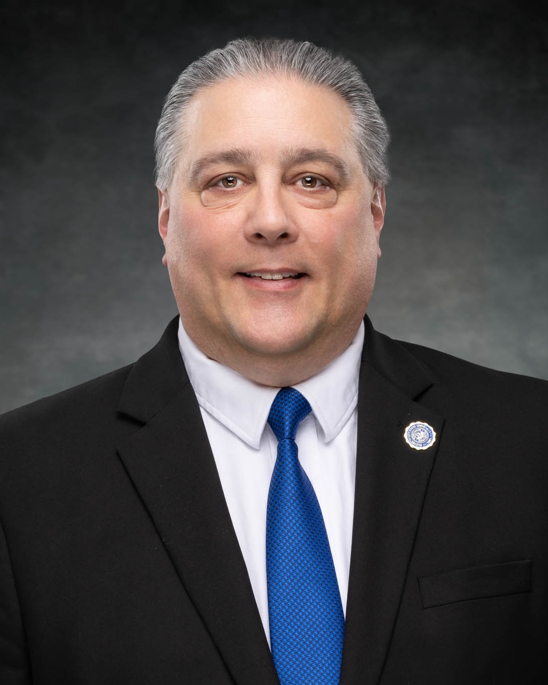 Robert Thibeault, Vice Chancellor for Business and Finance, smiling in a headshot
