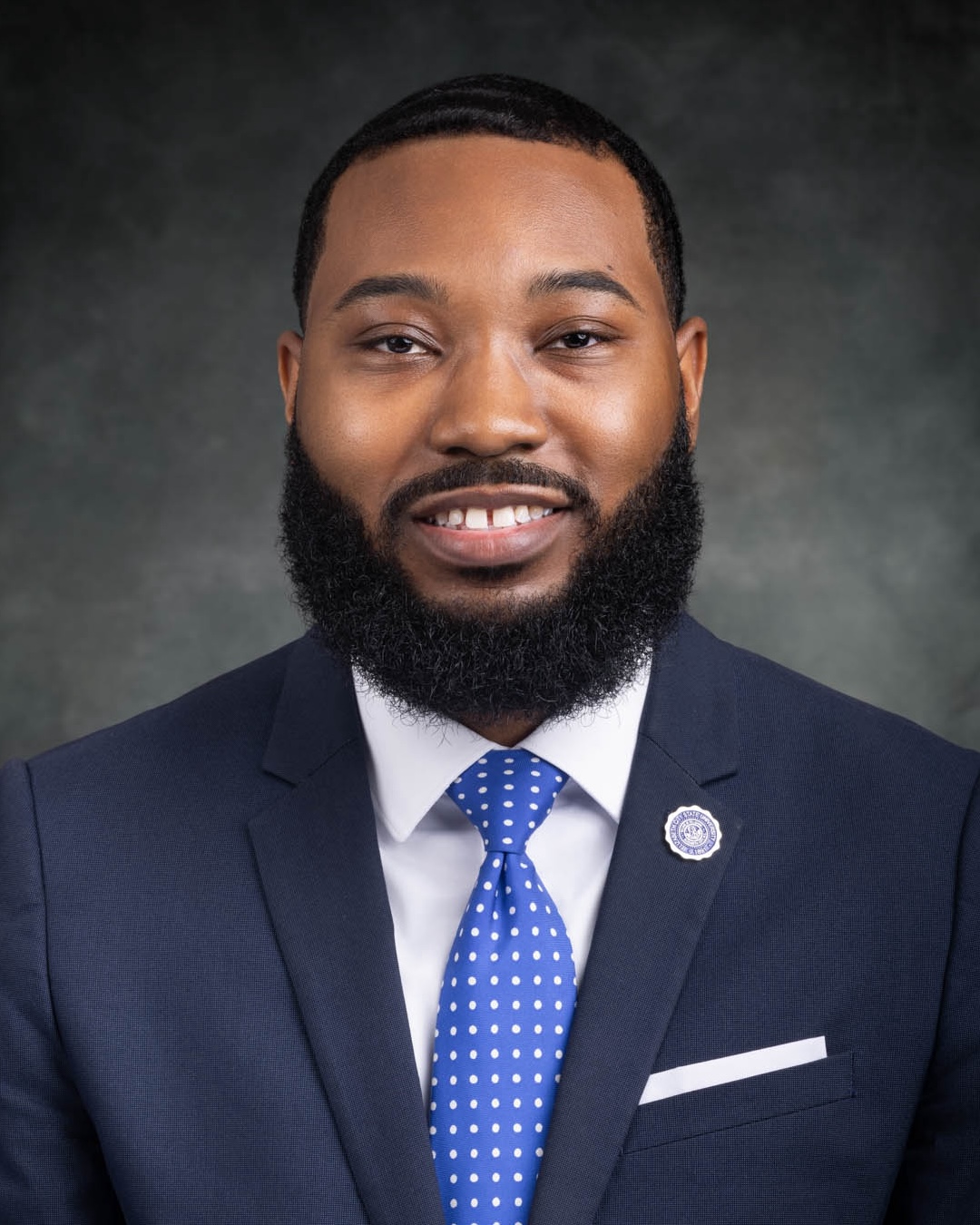 Robert Boone, Special Assistant to the Chancellor, smiling in a headshot