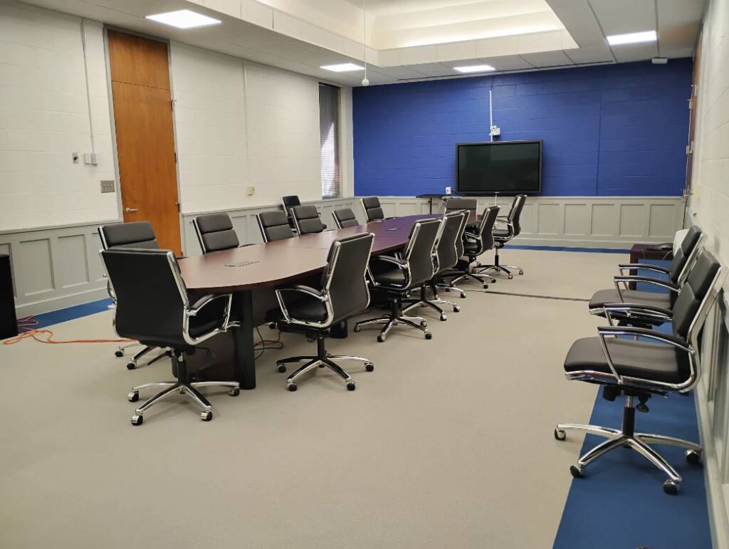 Boardroom in room 114 in the K.E. White Graduate Center. Fully furnished with a table and chairs.
