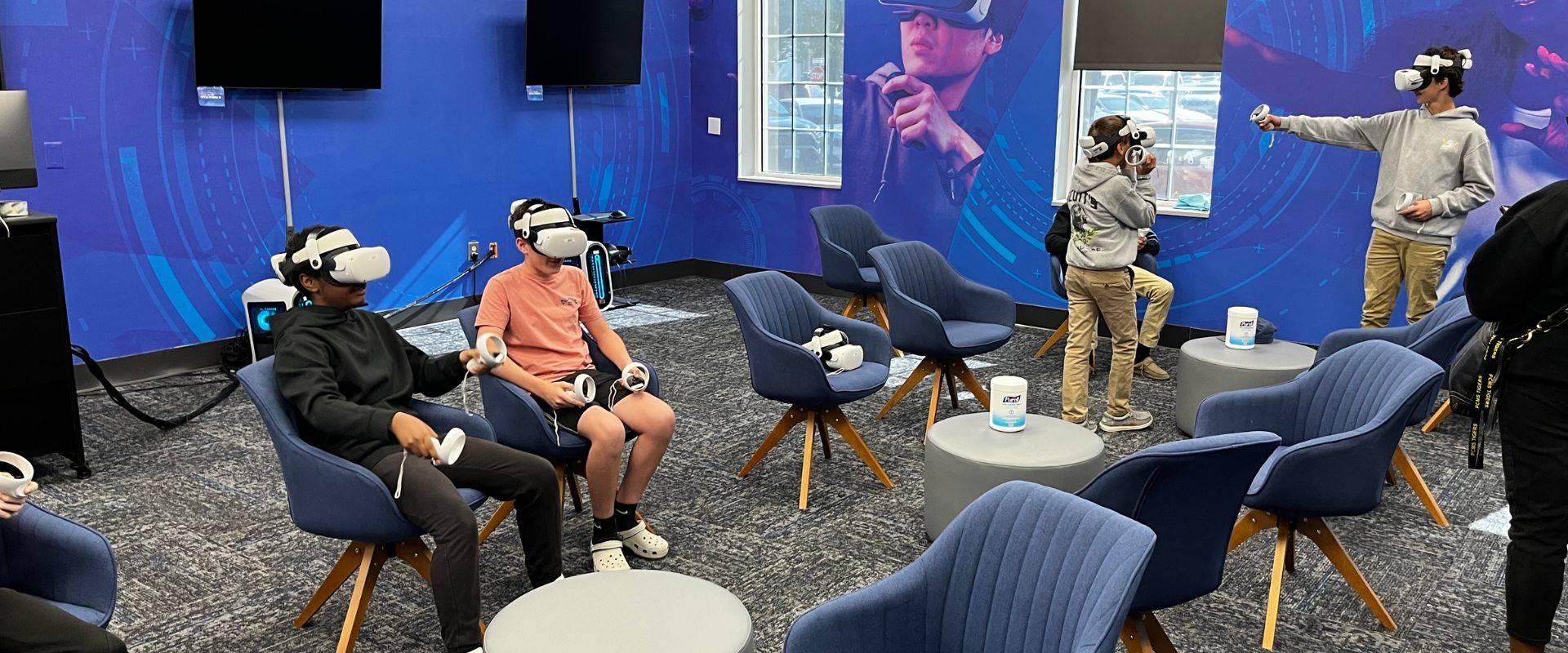 People in the Virtual Reality Lab with headsets on.